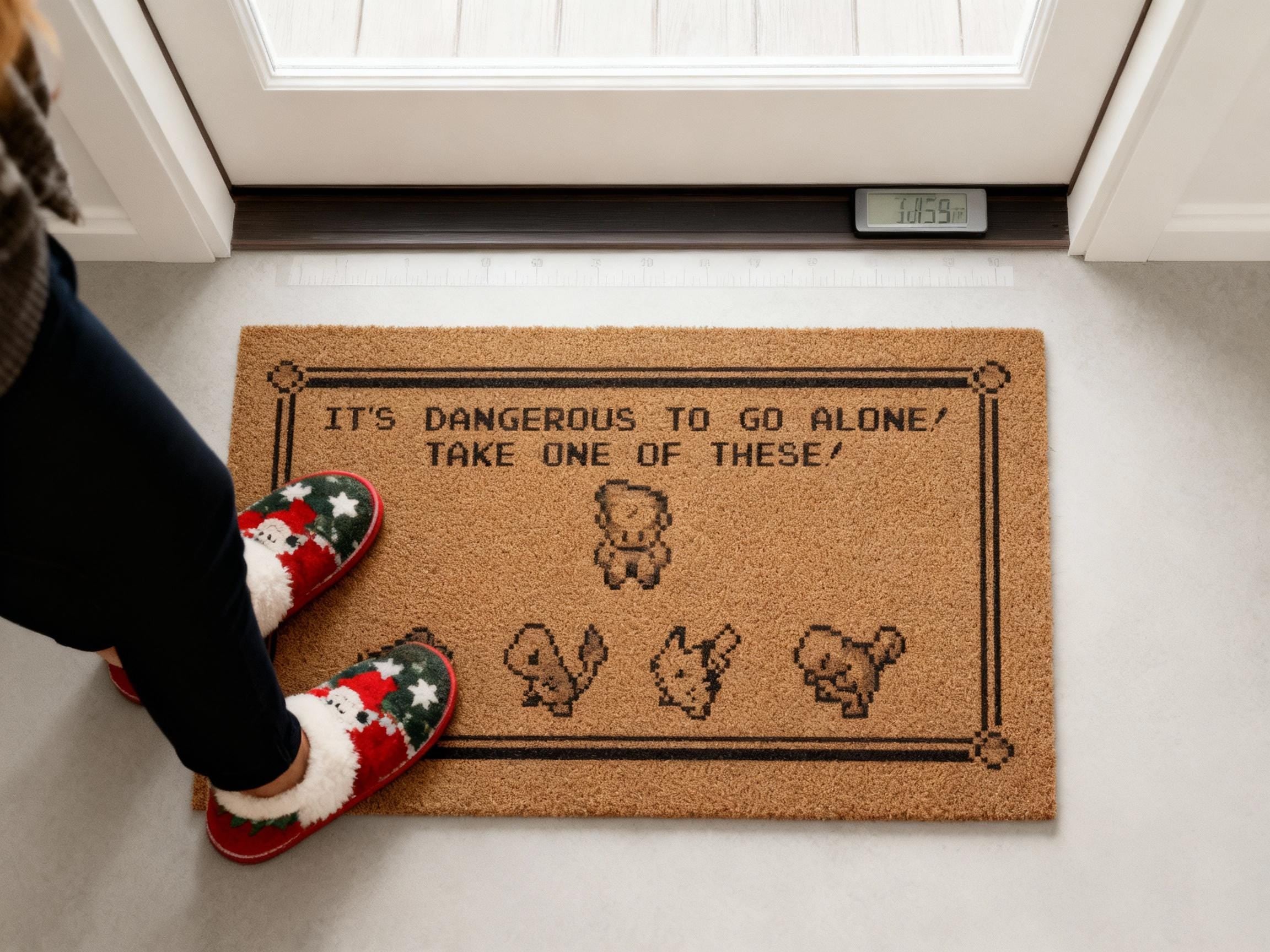 It’s Dangerous To Go Alone Take One Of These Doormat – Zelda x Pokémon Pixel Art Gamer Welcome Mat, Retro Nintendo Gift, Funny Home Decor